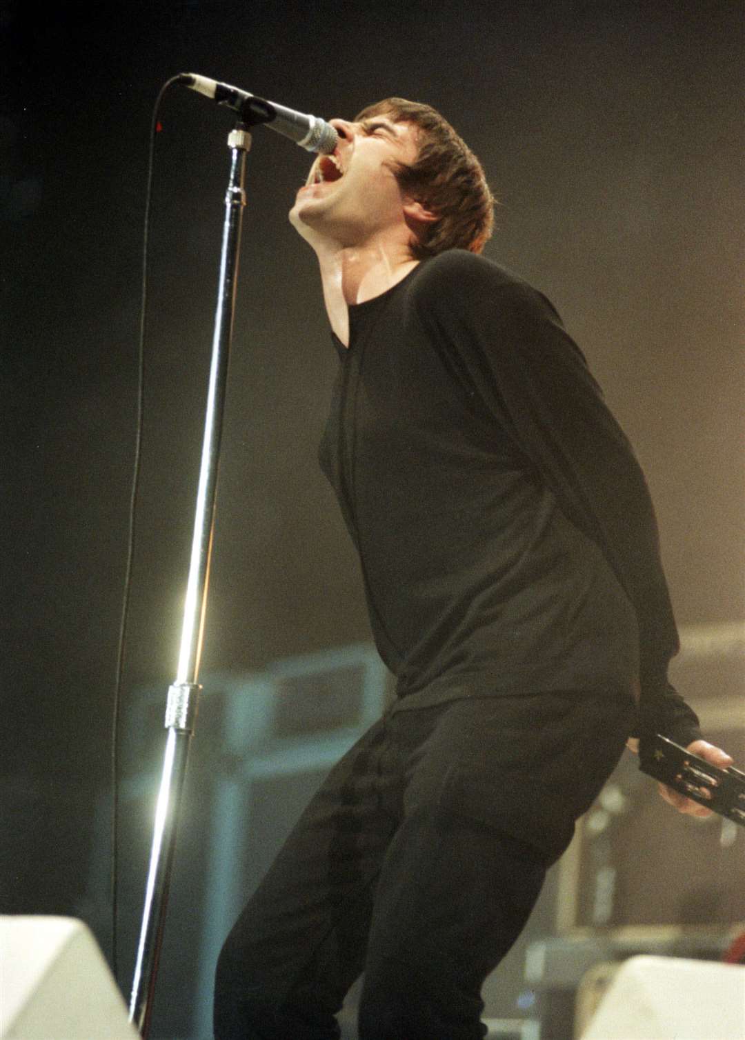 Oasis performing at Wembley Arena in 1997 (Adam Butler/PA)