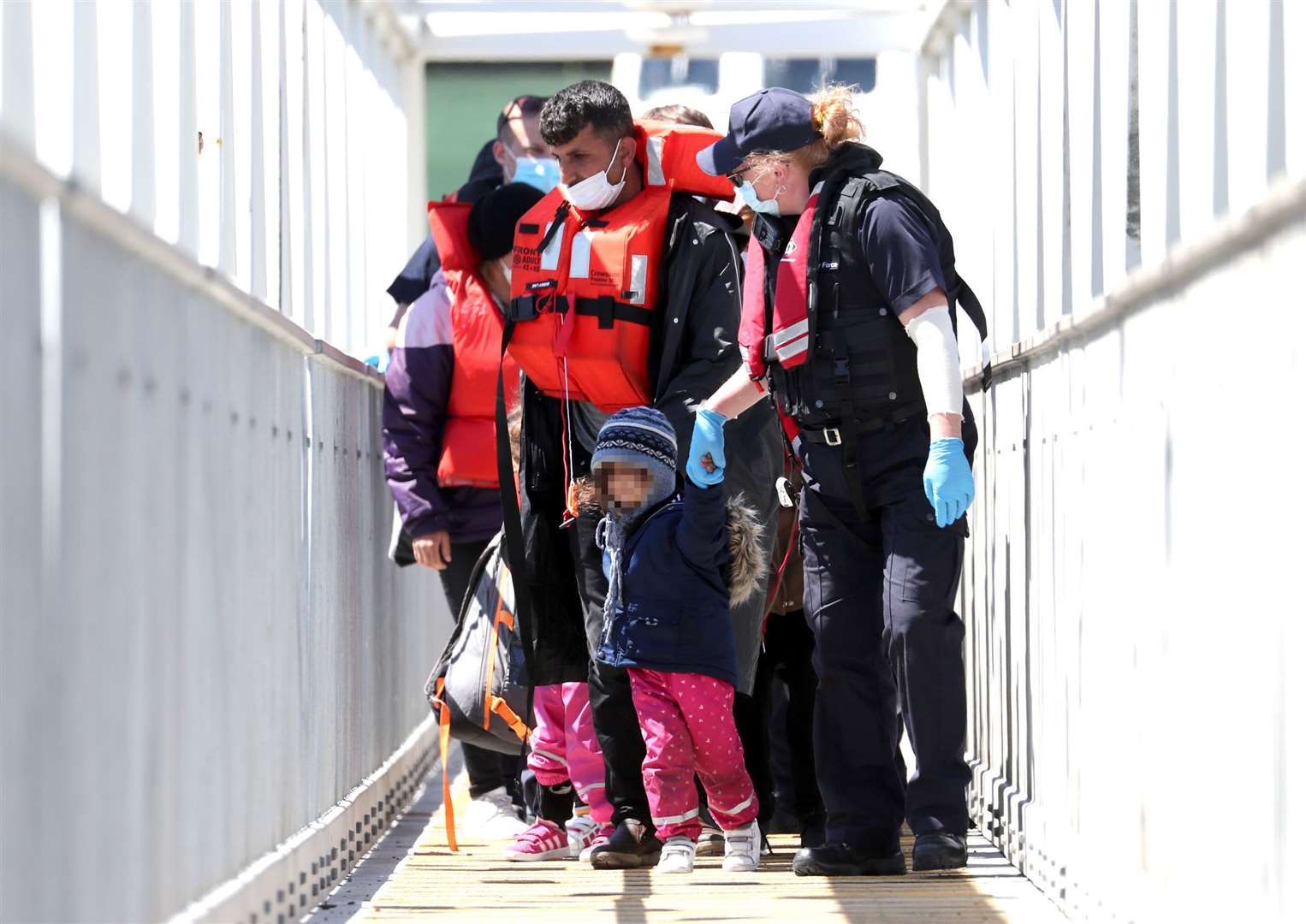 People arrive in Dover following a small boat incident in the Channel (Gareth Fuller/PA)