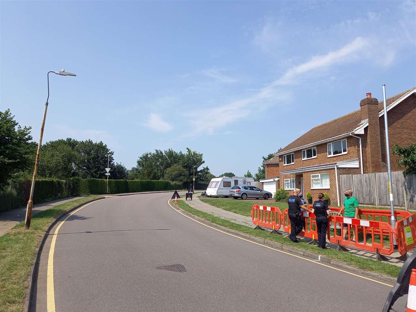 The lamppost on the left is the old one, while on the right stands the newly installed lamppost