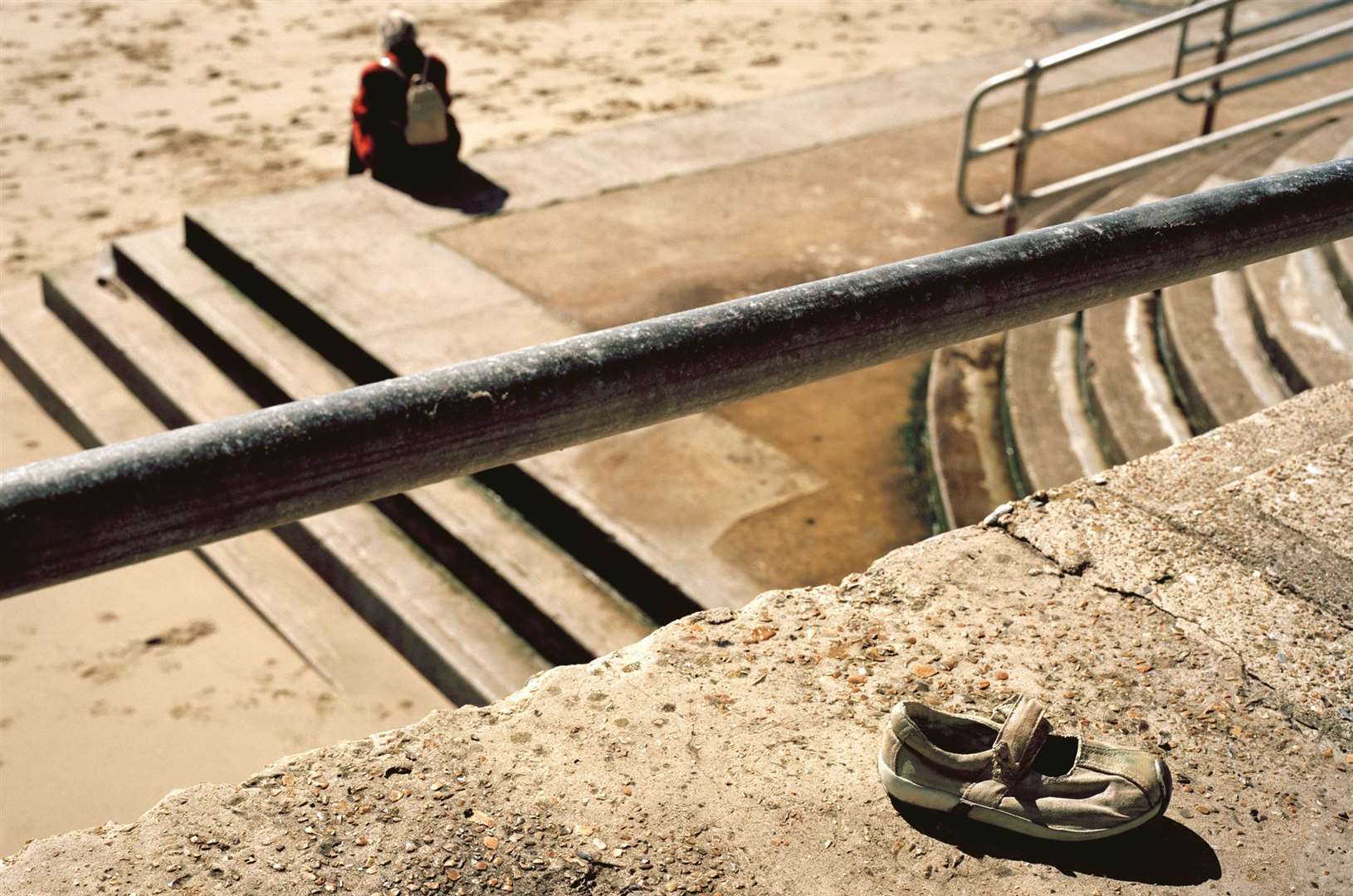 A baby’s shoe on a beach wall is also part of Emin’s Baby Things project. Picture: Thierry Bal/Yvette Illsley