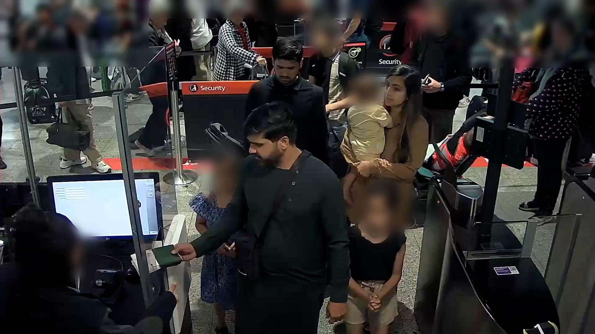 Sara Sharif’s father, stepmother and uncle going through passport control at Heathrow Airport in London (Surrey Police/PA)