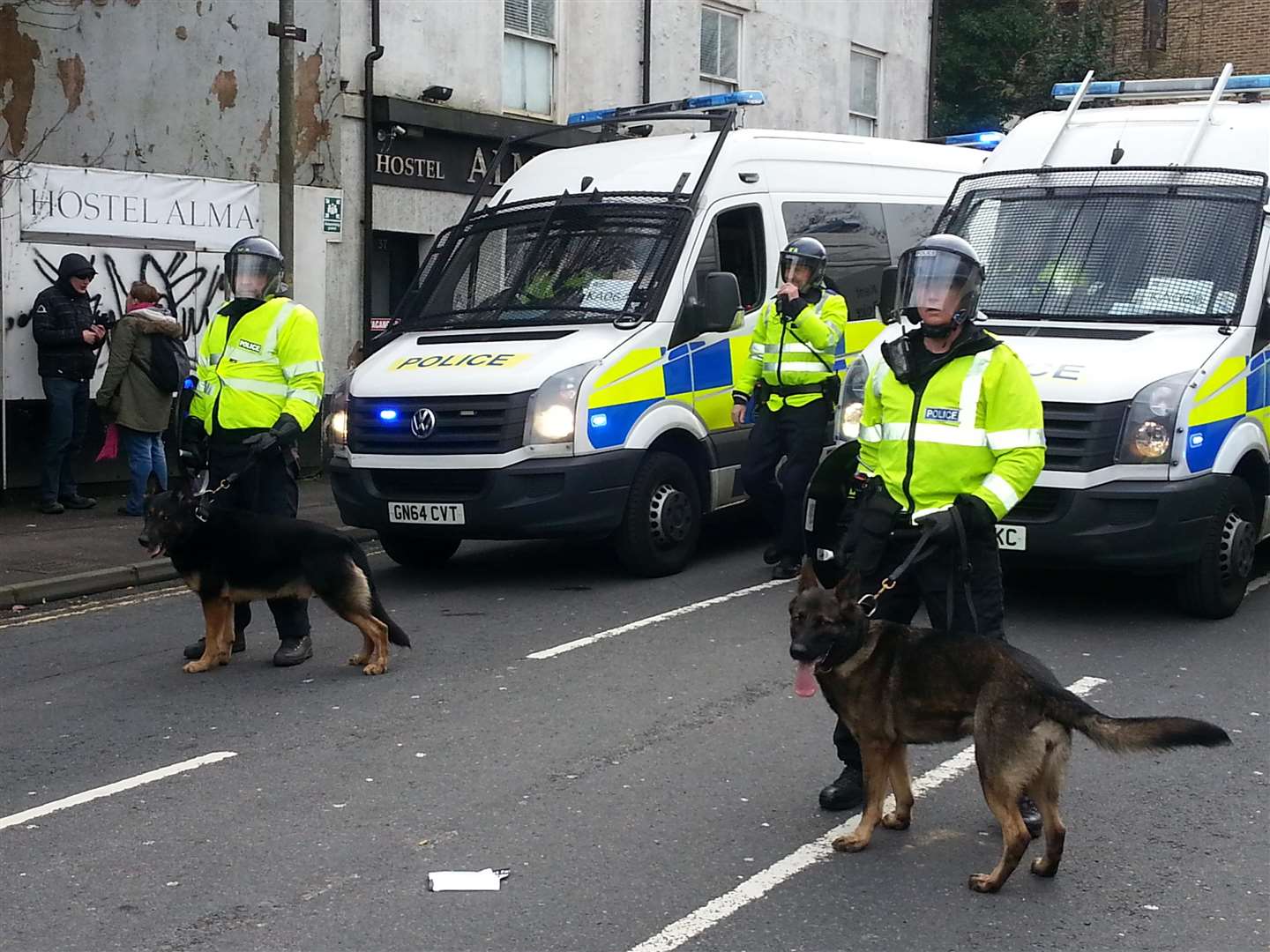Police, seen in Folkestone Road, brought the dogs out as trouble escalated during the 2016 march. Picture: Sam Lennon.