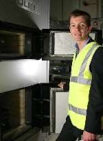 Cllr Mark Wooding (Con), cabinet member for the environment, with Maidstone council's biomass boiler