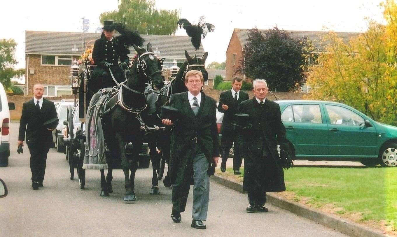 Medway funeral director Terry Allen leads the horse drawn carriage (16308107)