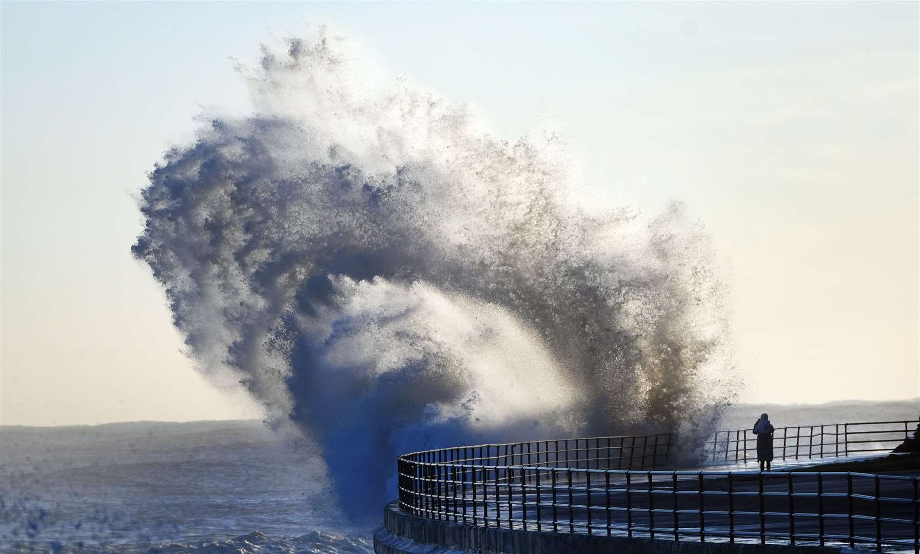 Huge waves smash against the seafront at Whitley Bay in North Tyneside (Owen Humphreys/PA)