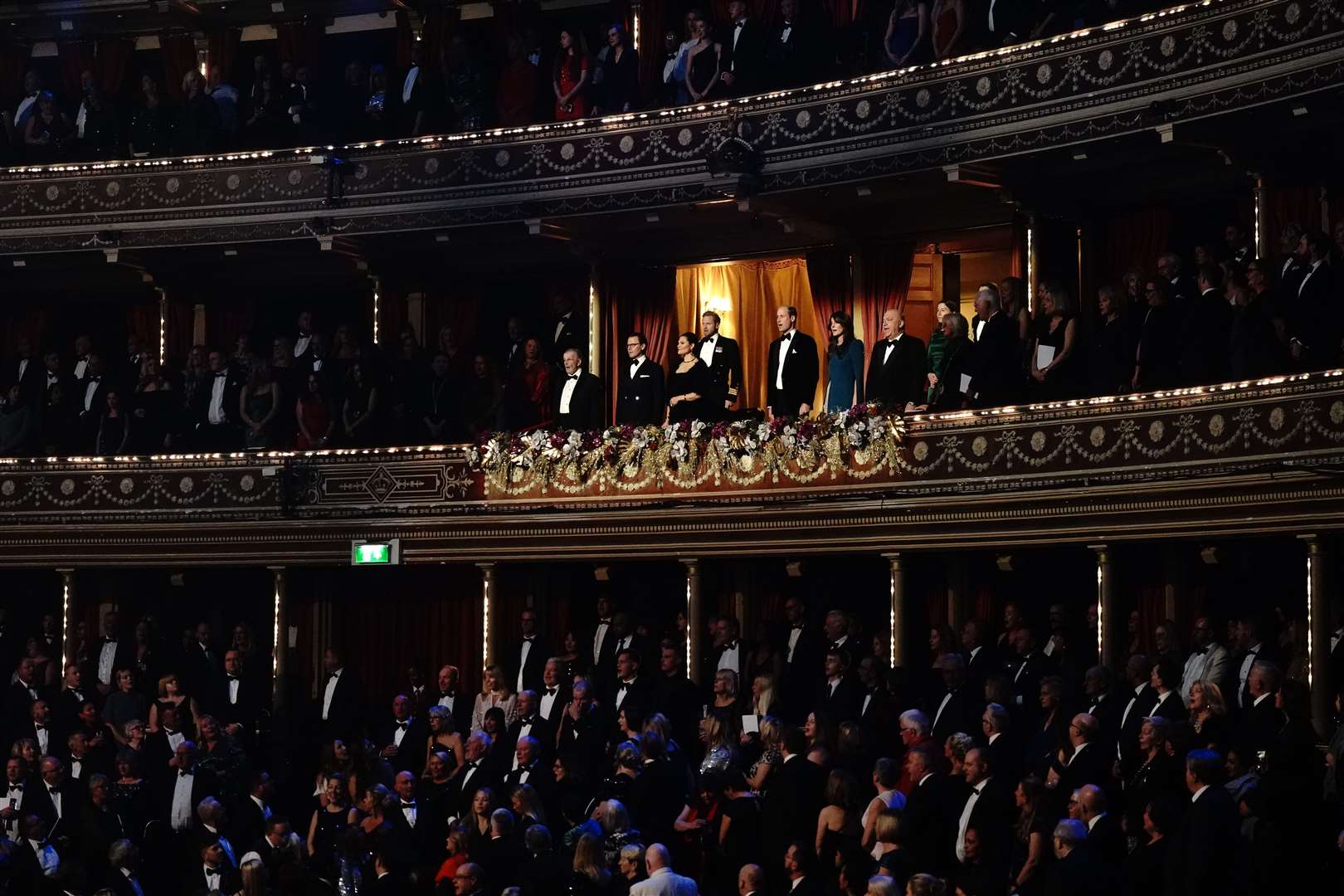 The Prince and Princess of Wales and Crown Princess Victoria and Prince Daniel of Sweden stand for the national anthem during the performance (Aaron Chown, PA)