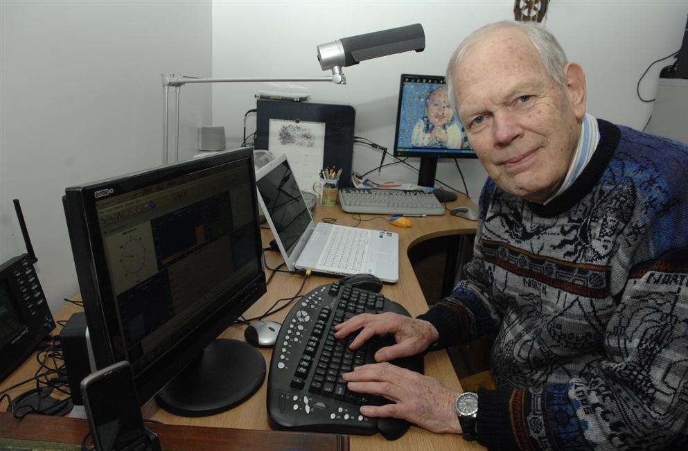 Jeremy Procter analysing the data from his weather monitoring station