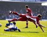 Nicky Southall goes over under challenge from Paul Boertien. Picture: MATTHEW READING