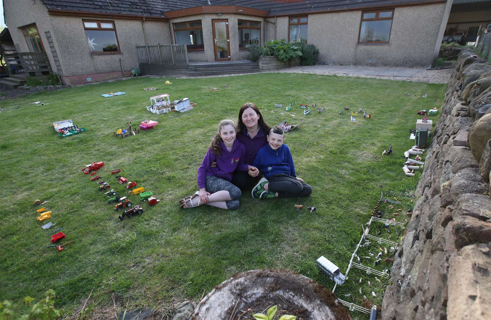 Lorna Muirhead with her children Ailie and Hamish (Andrew Milligan/PA)