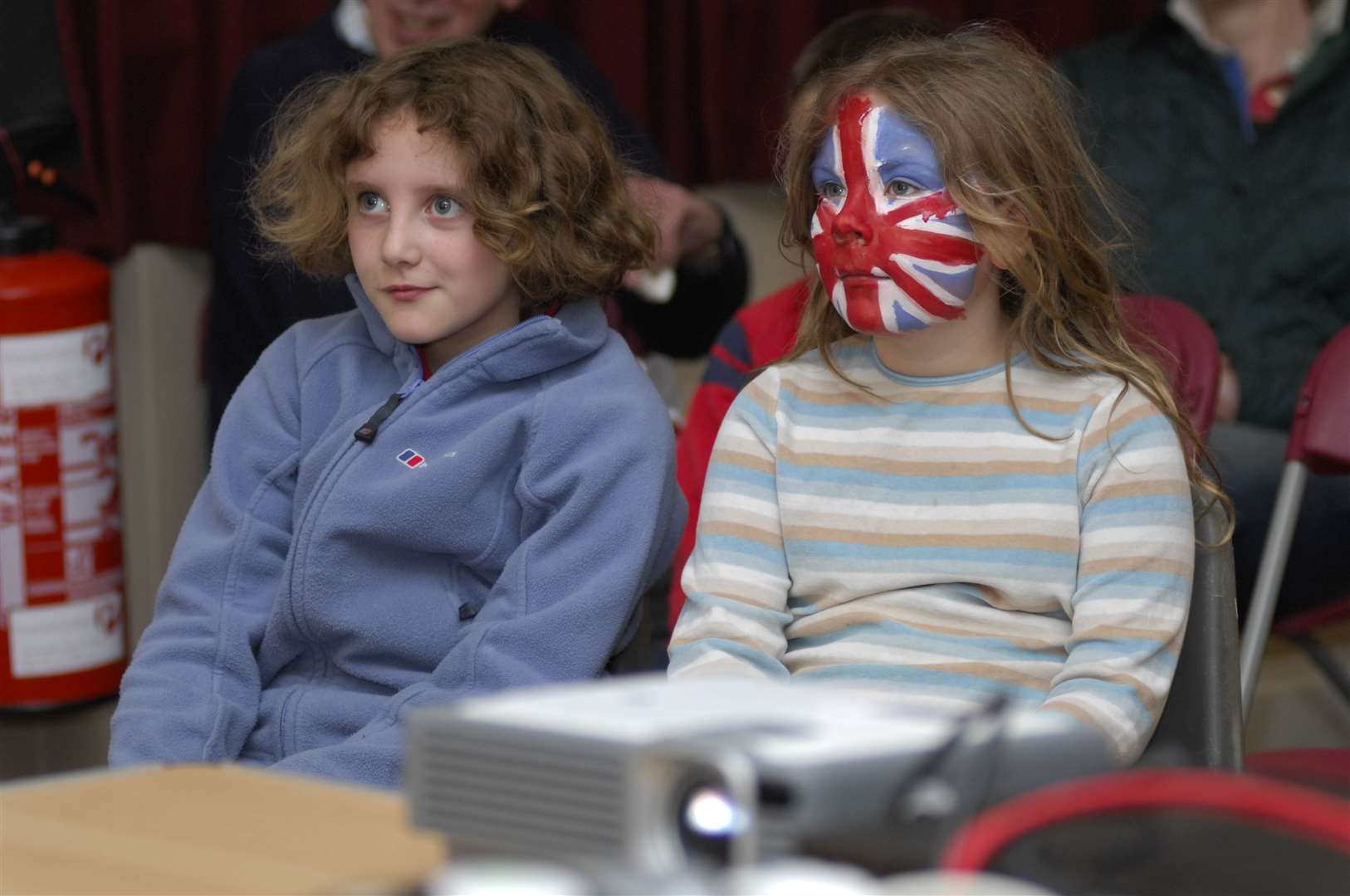 Eleanor Boyle and Eleanor Harris-Hall watch the service at Little Chart, Ashford