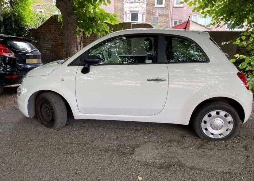 One of the cars along Clarence Row which has had its tyres let down last June