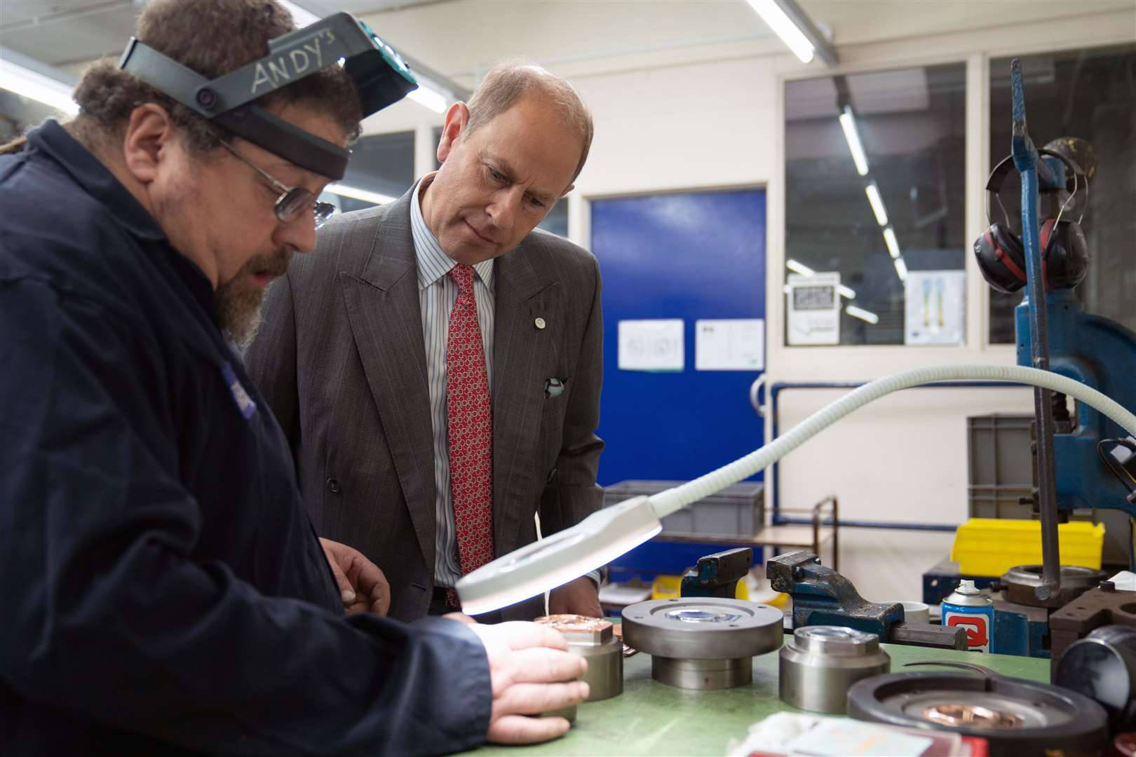 The Earl of Wessex watches medals being minted (Joe Giddens/PA)