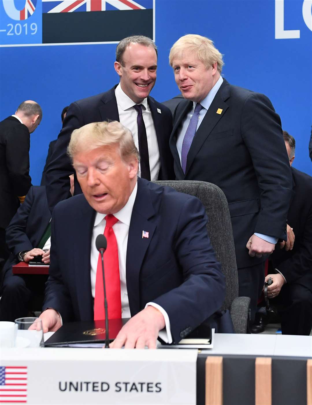 Dominic Raab (back left) and Boris Johnson were reportedly in crisis talks after Trump administration officials reacted angrily to the Interpol notice (Stefan Rousseau/PA)