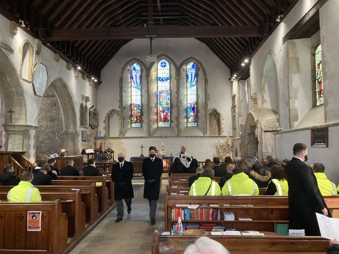 Sheppey EMUs founder David O'Neill's funeral at Minster Abbey saw guests wear yellow hi vis jackets in his honour. Picture: John Nurden