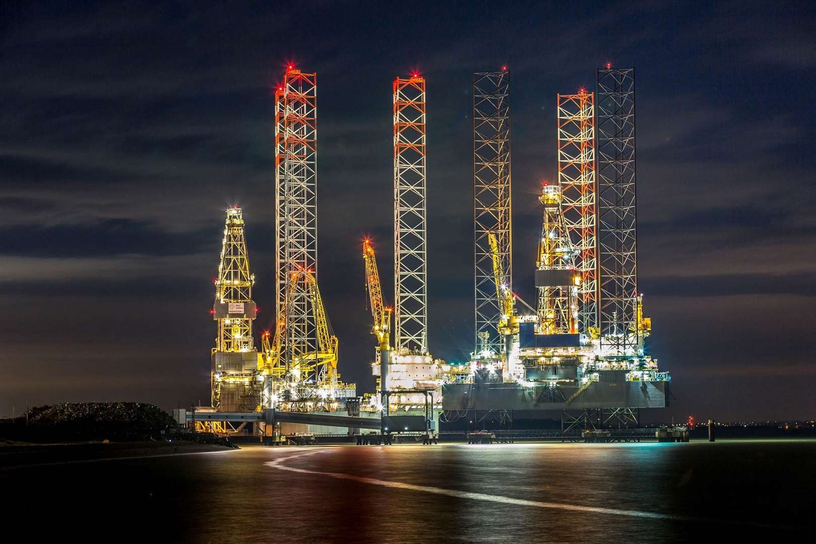 Two oil rigs at night moored at Sheerness. Picture: Glen Smith
