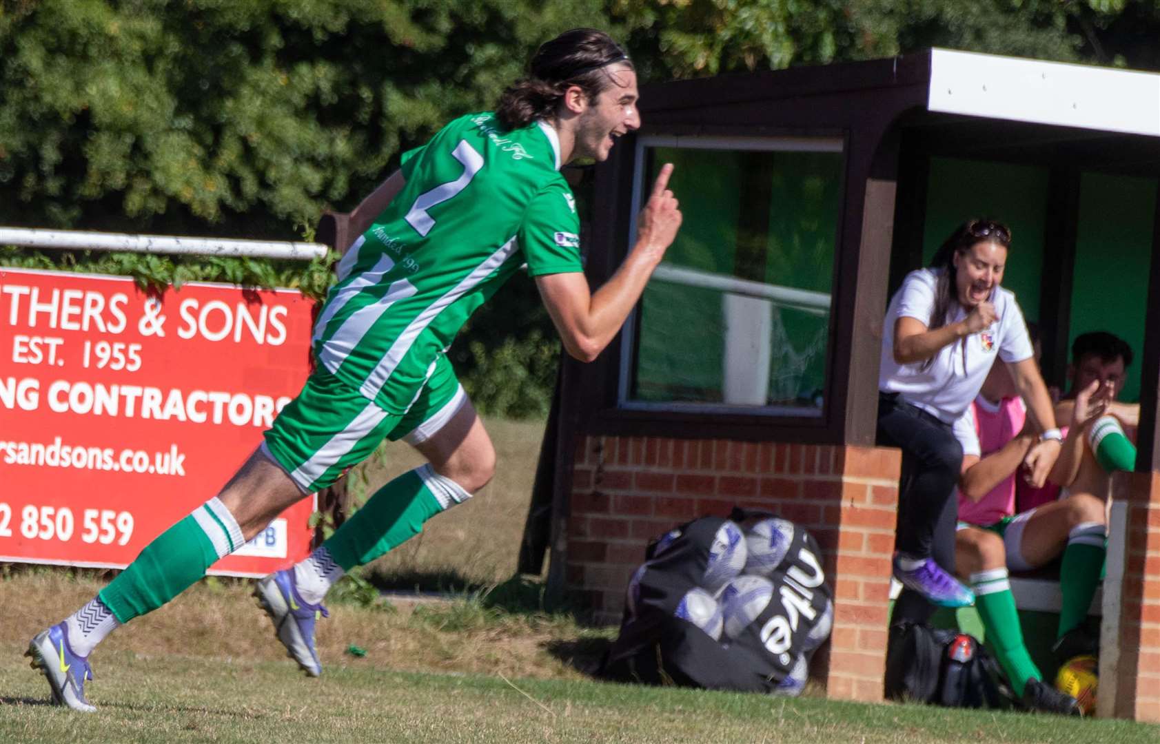 Louis Anderson celebrates his free-kick for Rusthall against Ramsgate on Saturday - Rusthall are in the FA Cup First Qualifying Round for the first time in their history. Picture: Dean Jacquin