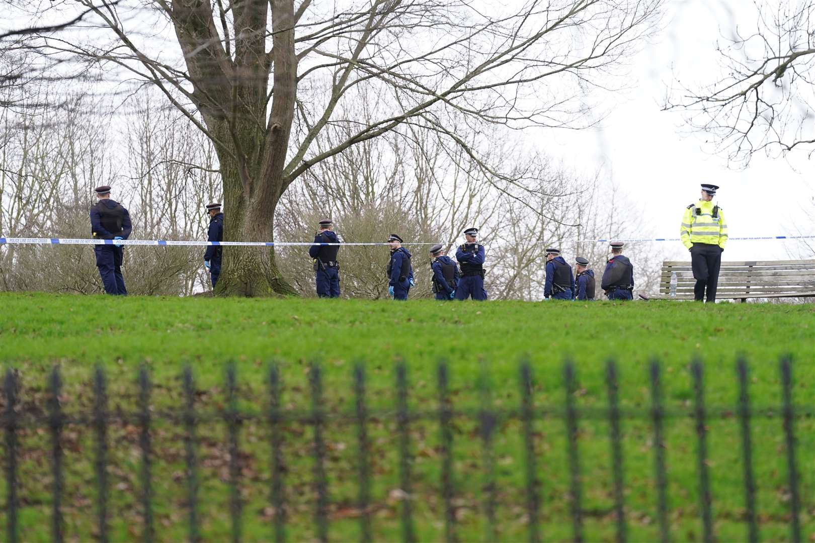 Police conduct a fingertip search of the area following the teenager’s death (Stefan Rousseau/PA)