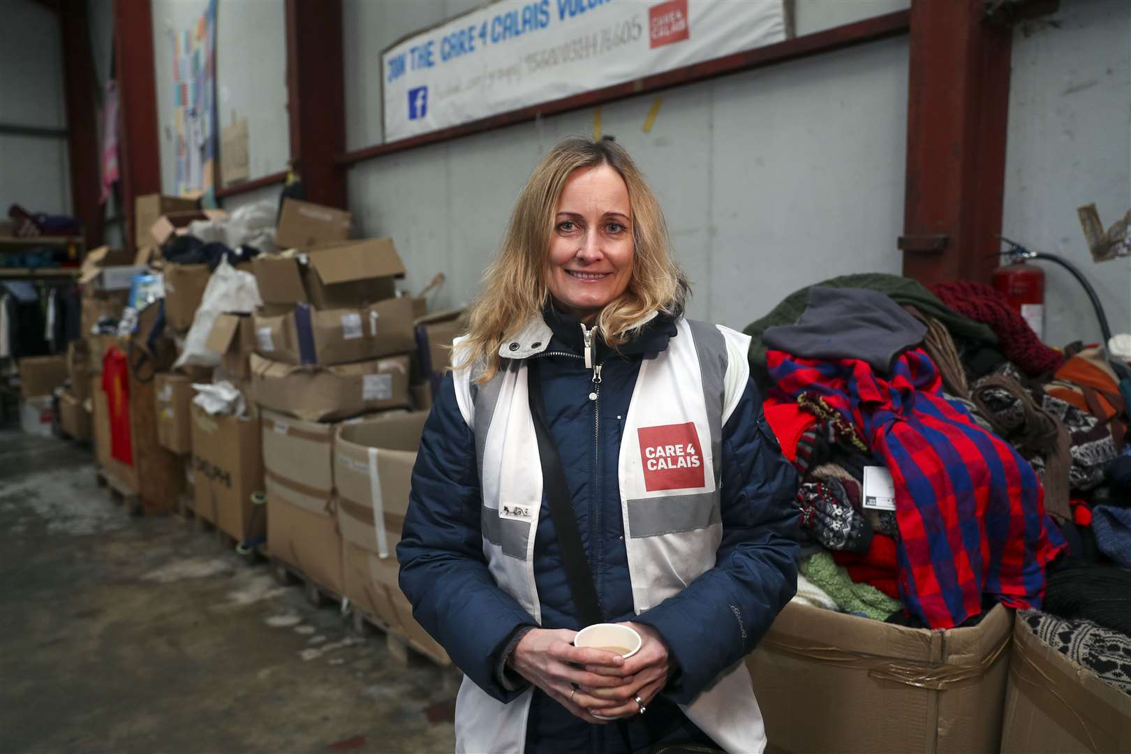 Clare Moseley, founder of Care4Calais in their warehouse near Calais (Steve Parsons/PA)