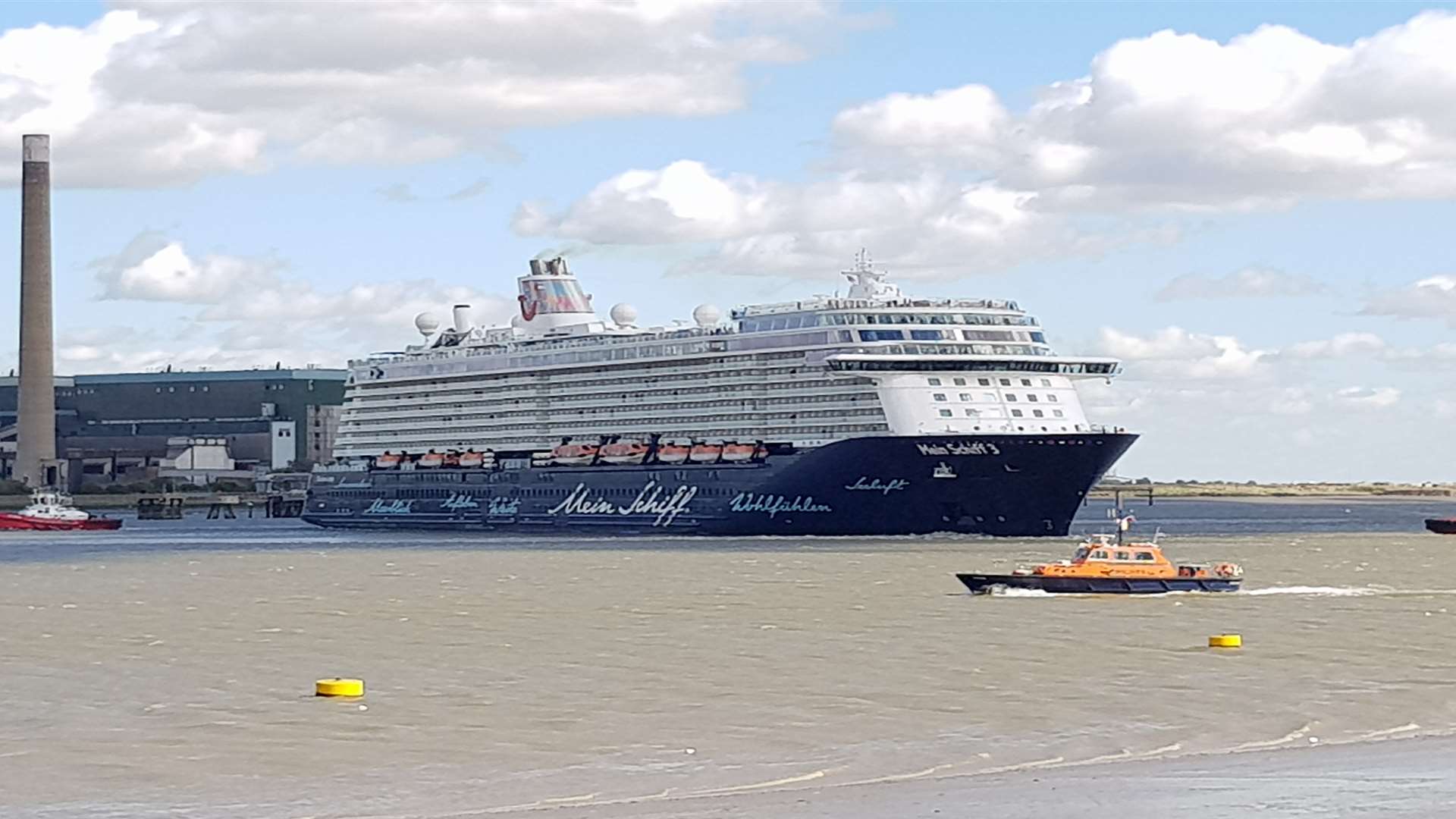 Onlookers Gather As Giant Cruise Ship Sails Past Gravesend