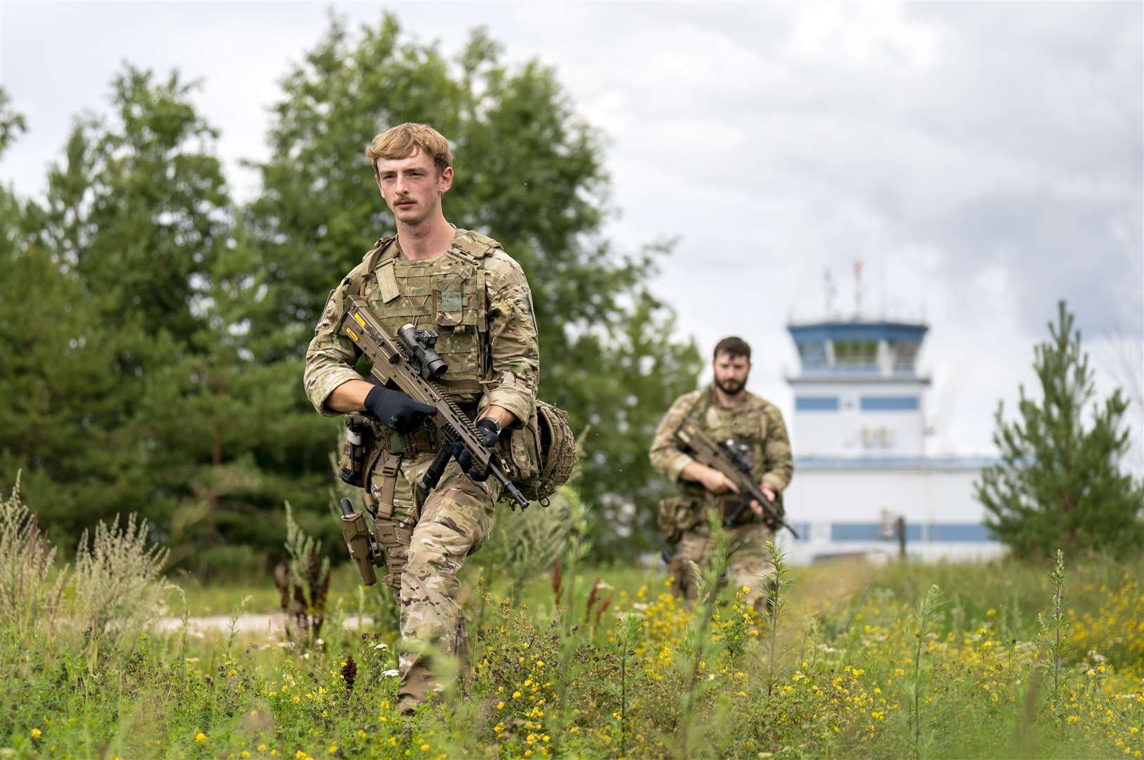 Air RAF Specialist 1 Harrison Malkin, left, and Air Specialist 1 Harry Walker carry out internal security checks during deployment on Operation Azotize (Jane Barlow/PA)