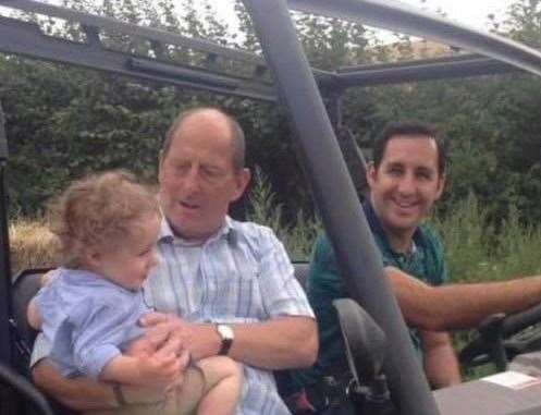 Dr Chris Neal with son-in-law Nick Richards and grandson Jack in his Polaris Ranger farm truck, which was stolen from Milstead at the end of May