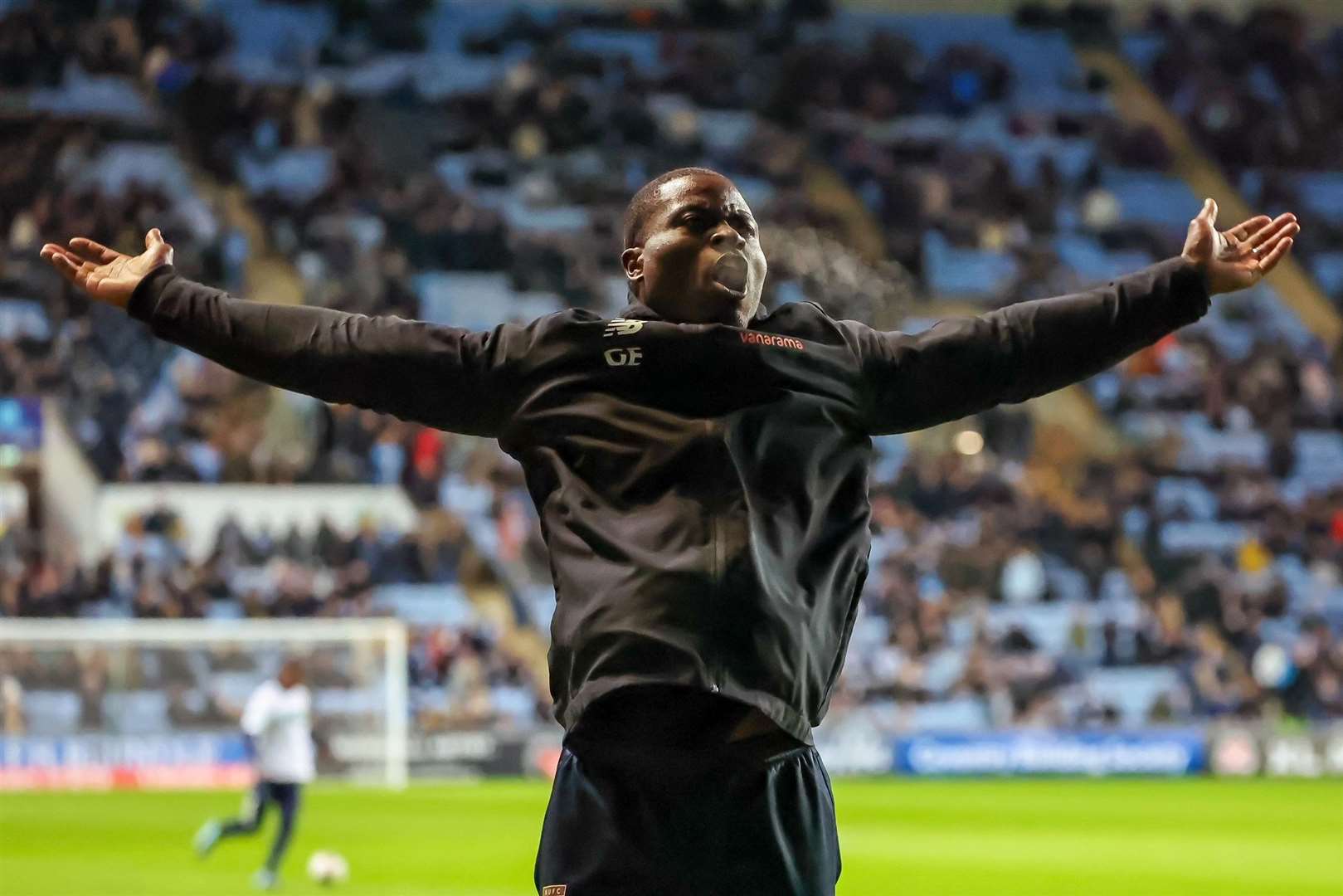 Maidstone United manager George Elokobi greets away fans at the CBS Arena. Picture: Helen Cooper