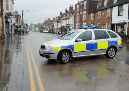 The scene in Wincheap yesterday when police cordoned off the road after a suspect packeg was found. Picture: Barry Goodwin