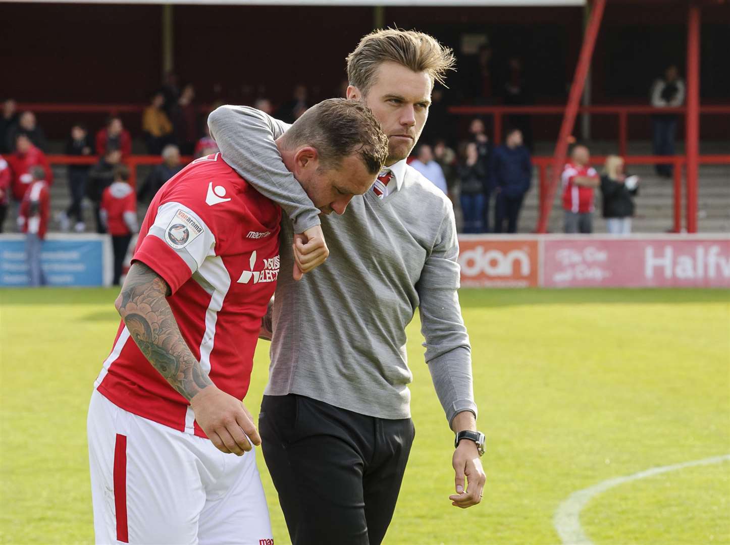 Daryl McMahon consoles Danny Kedwell after his penalty miss in the 2016 play-off final Picture: Andy Payton