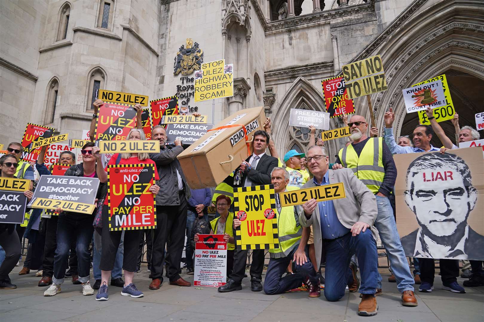 Anti-Ulez protesters outside the High Court in London (Lucy North/PA)