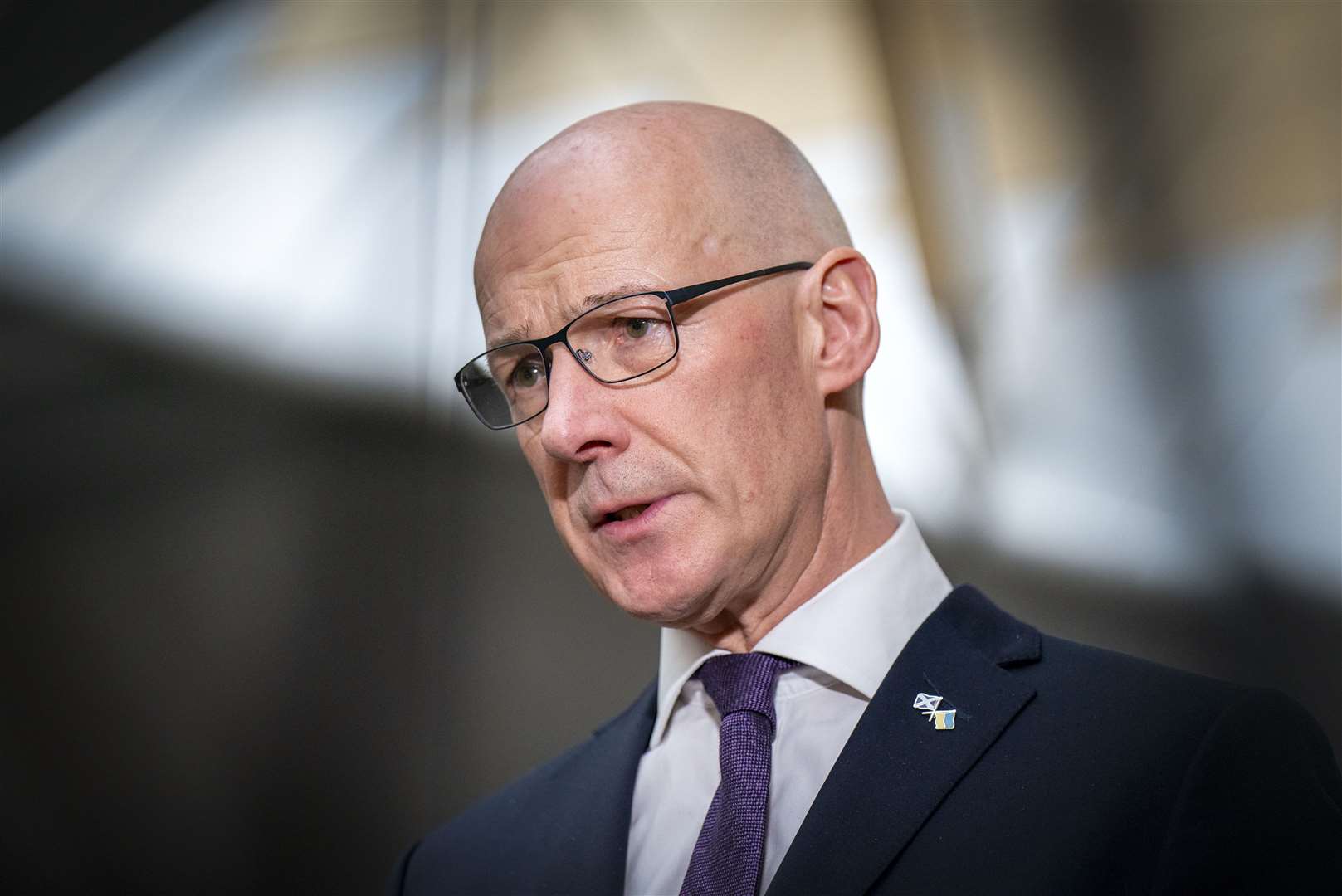 John Swinney said the Budget does not go far enough for Scotland (PA)