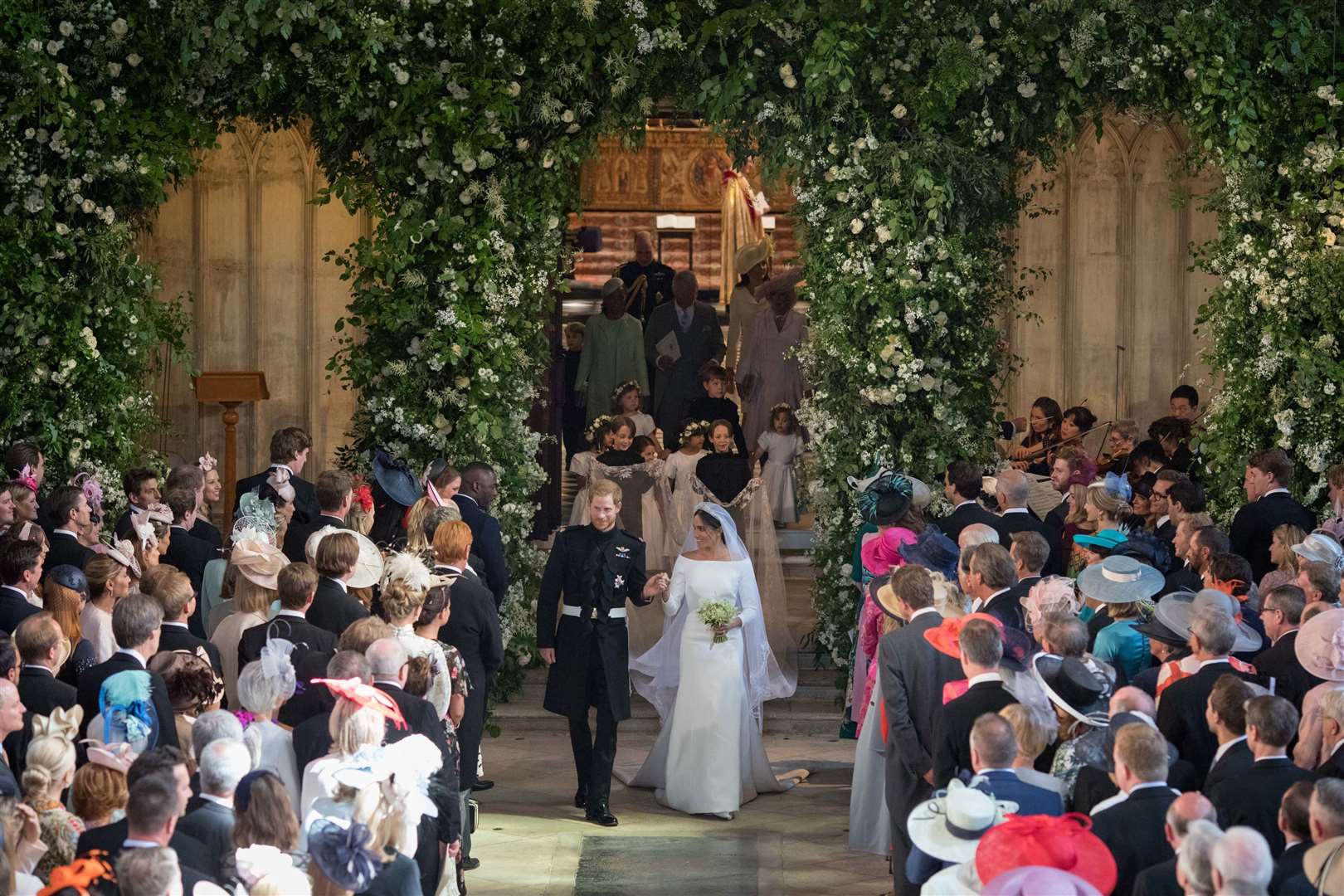 Harry and Meghan Markle leave St George’s Chapel at Windsor Castle after their wedding in 2018 (Dominic Lipinski/PA)