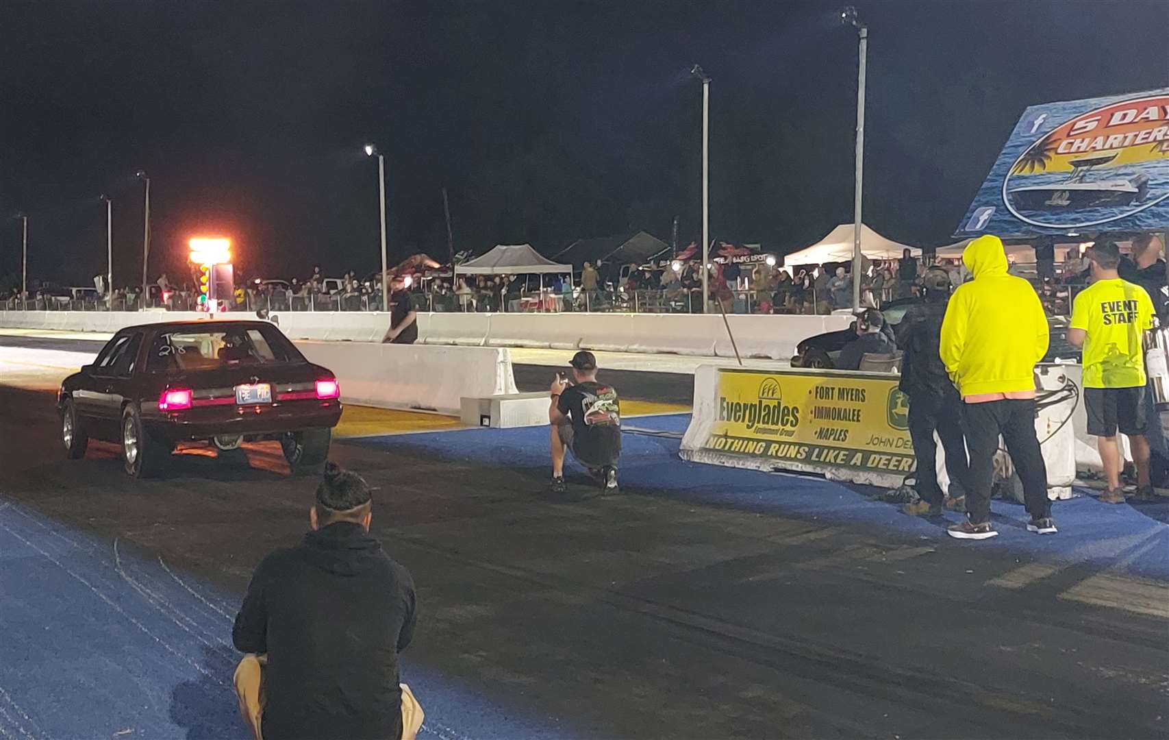 A hot rod about to launch on a drag strip