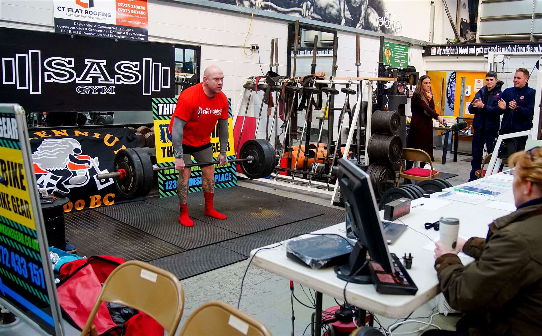 Firefighter Glen Bailey, 42, attempted to break the Guinness World Record for the most weight lifted in 24 hours at the SAS gym in Leyland, Lancashire, to raise money for the The Fire Fighters Charity. (Peter Byrne/PA)