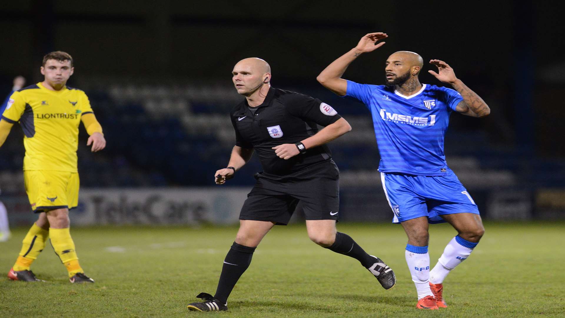 Josh Parker watches his second-half strike hit the target but referee Charles Breakspear, left, didn't think the ball crossed the line Picture: Gary Browne