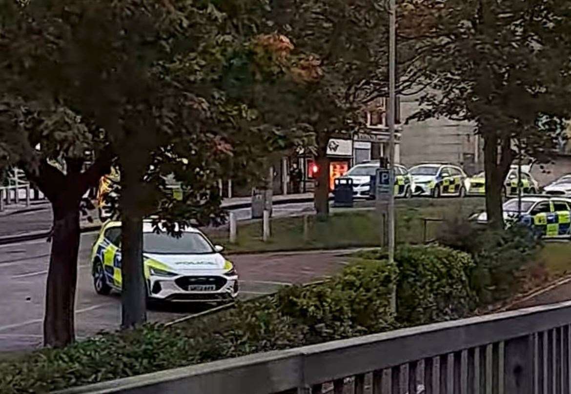 The first officers at the scene in Guildhall Street, Folkestone, came under fire from broken glass being thrown from two upstairs windows – before reinforcements arrived and stormed the building