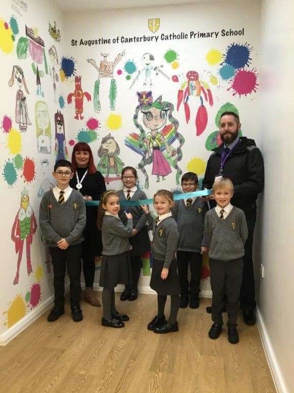 St Augustine of Canterbury Catholic Primary teacher Louise Prestidge and pupils with James Sutton of Medway Council at the unveiling of the school’s new superhero mural (23154766)