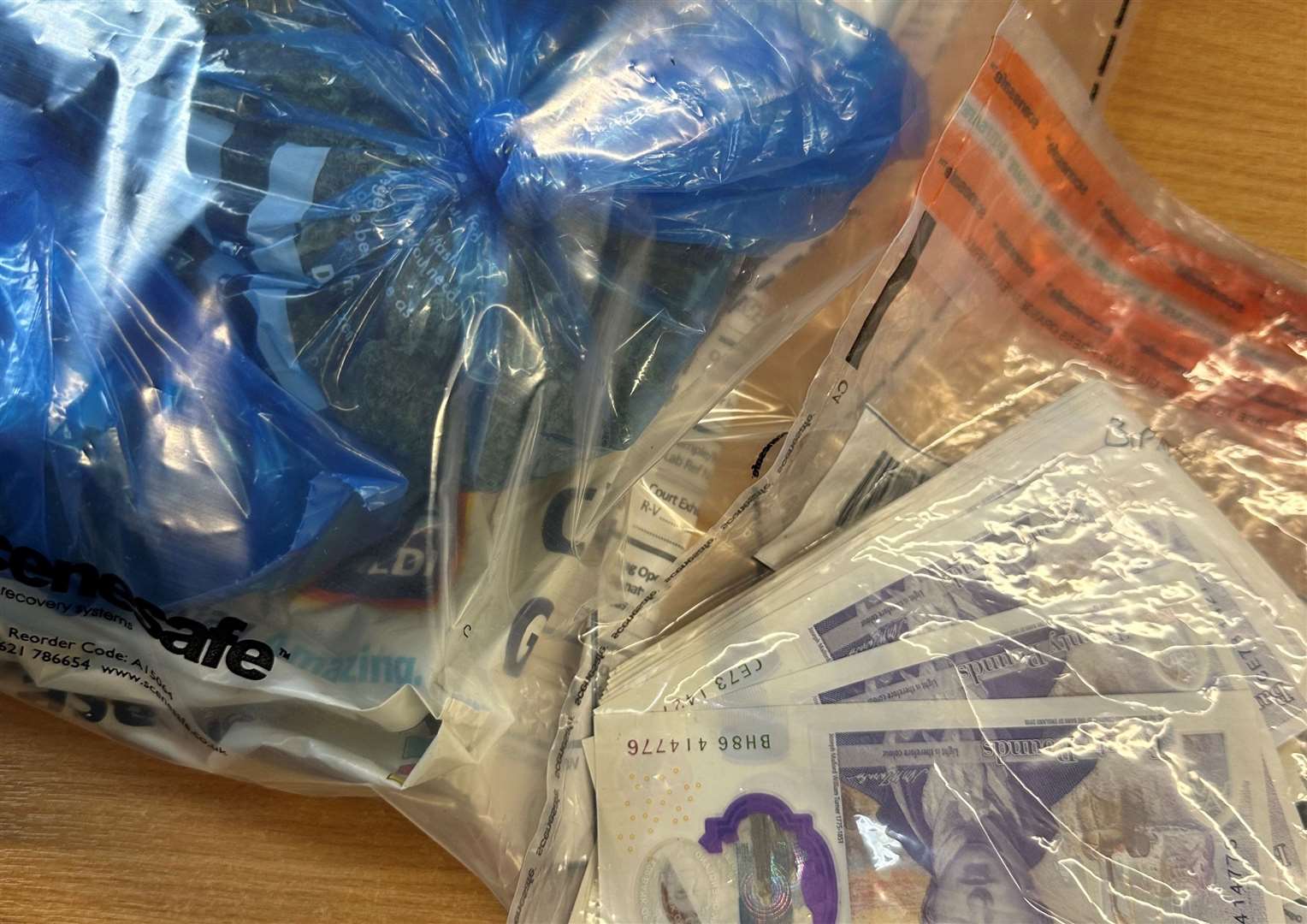 Drugs, cash and a zombie knife were found after police became suspicious of a vehicle in the Jemmett Road area of Ashford. Pictures: Kent Police