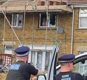 Police outside a property in Vincent Gardens after reports of a man damaging a house. Picture: Laura Nina