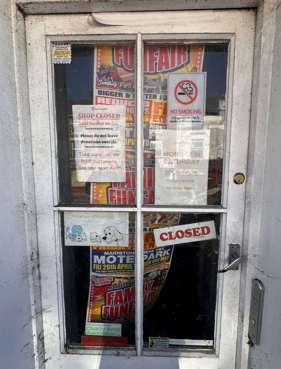 The notices on the door of Save the Children in Union Street, Maidstone