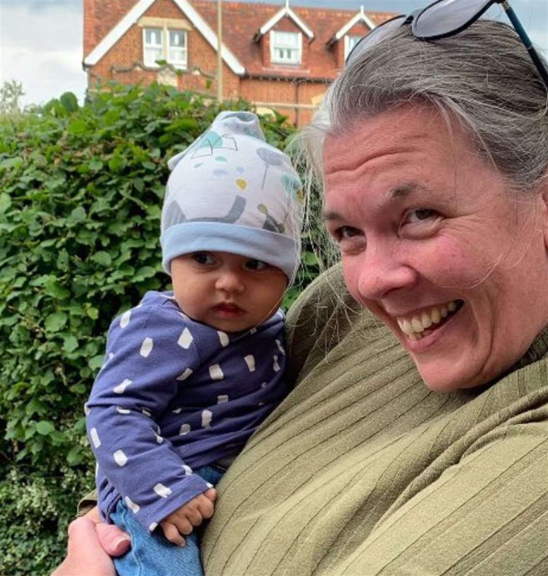 Ms Webster with the daughter of an Afghan refugee she helped (Sayed/PA)