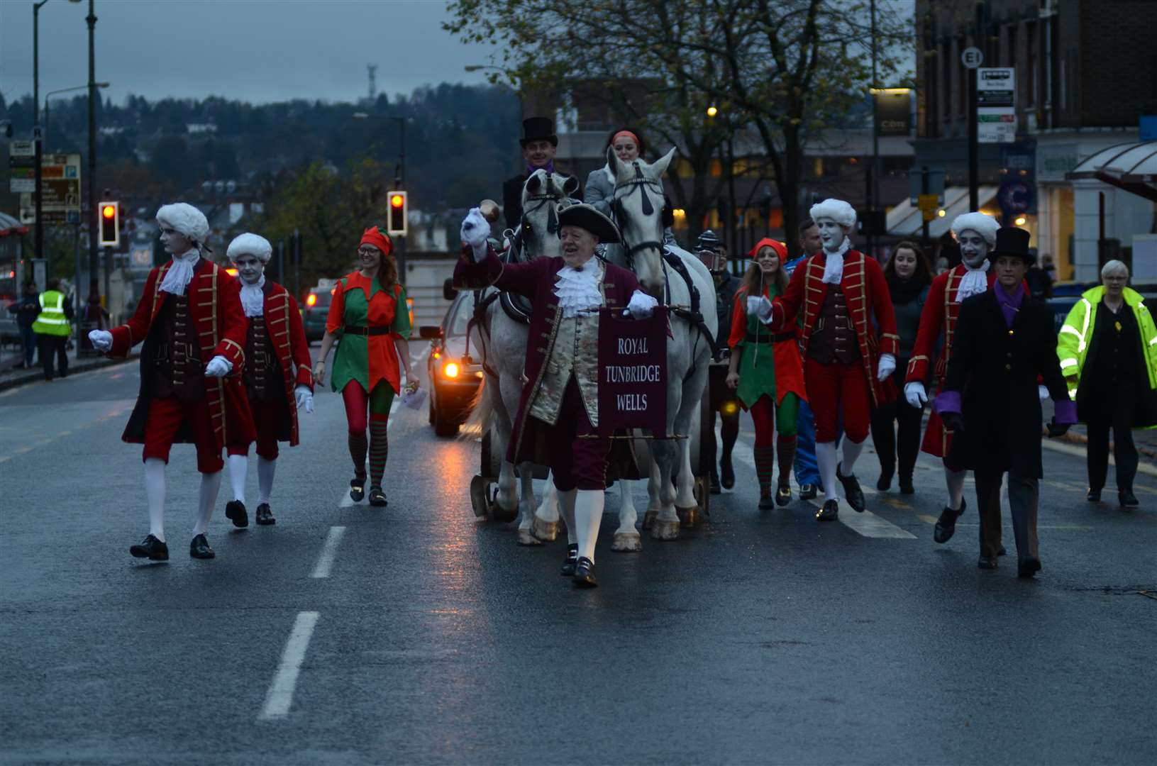 Father Christmas makes his way to the centre with the Fairy Godmother