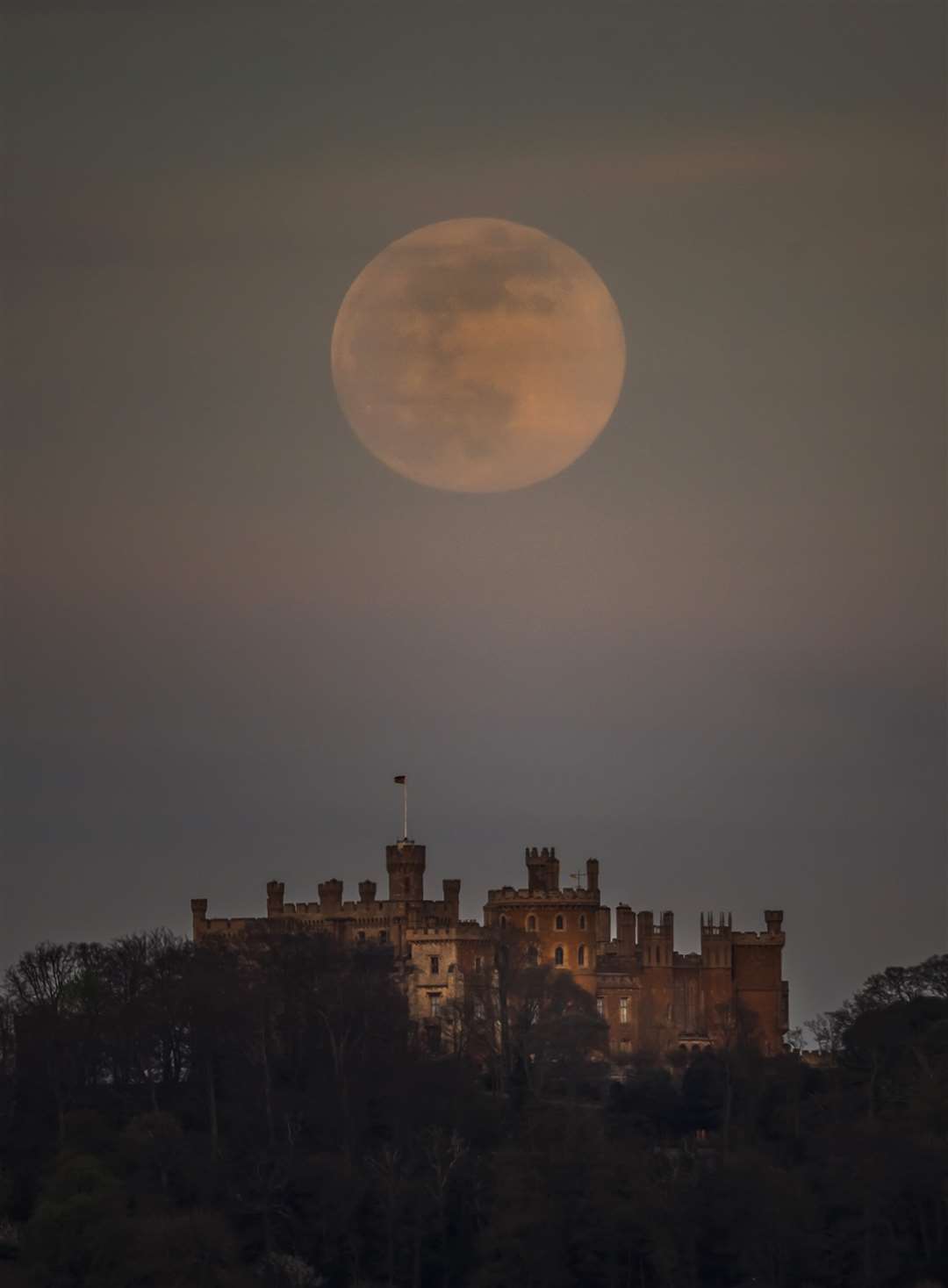 The pink supermoon over Belvoir Castle in Leicestershire (Danny Lawson/PA)