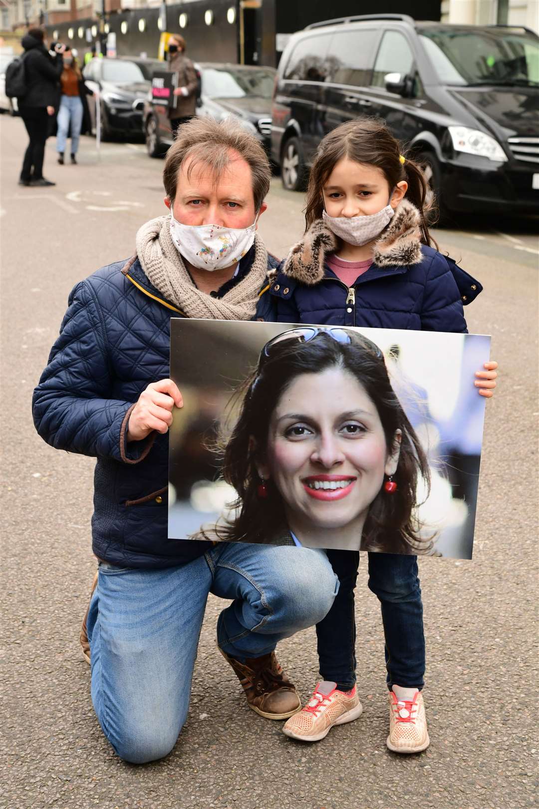 Mr Ratcliffe and his daughter during a protest outside the Iranian Embassy in London in March 2021 (Ian West/PA)