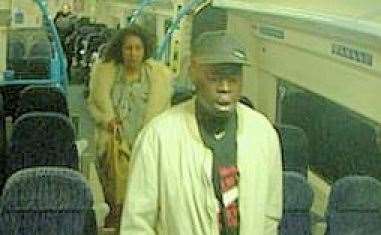 The photo shows a man and a woman travelling on a train to London. Picture: Kent Police