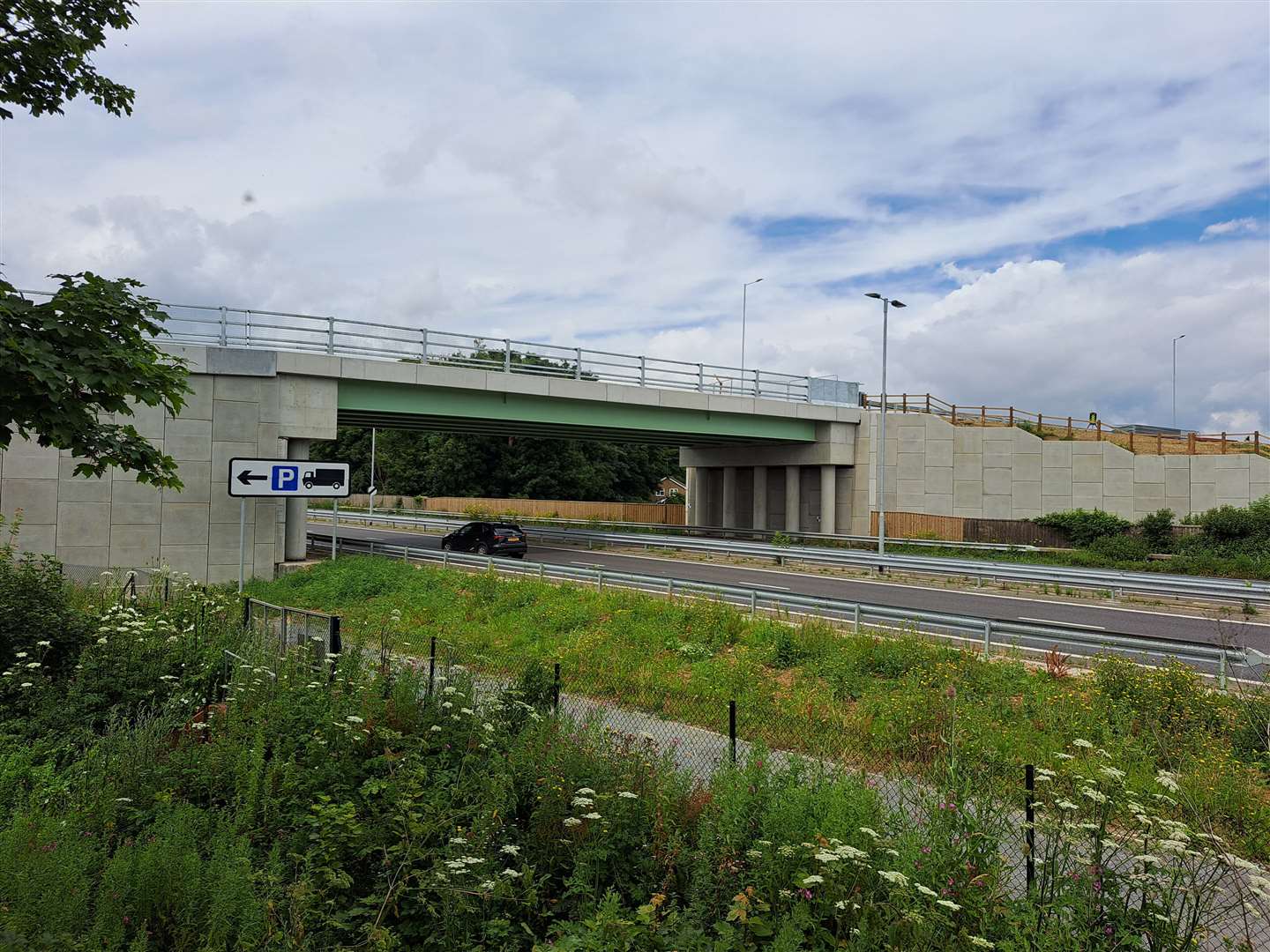 A new bridge has been built over the A2 for the new Dover Fastrack service - but the electric buses are still not running