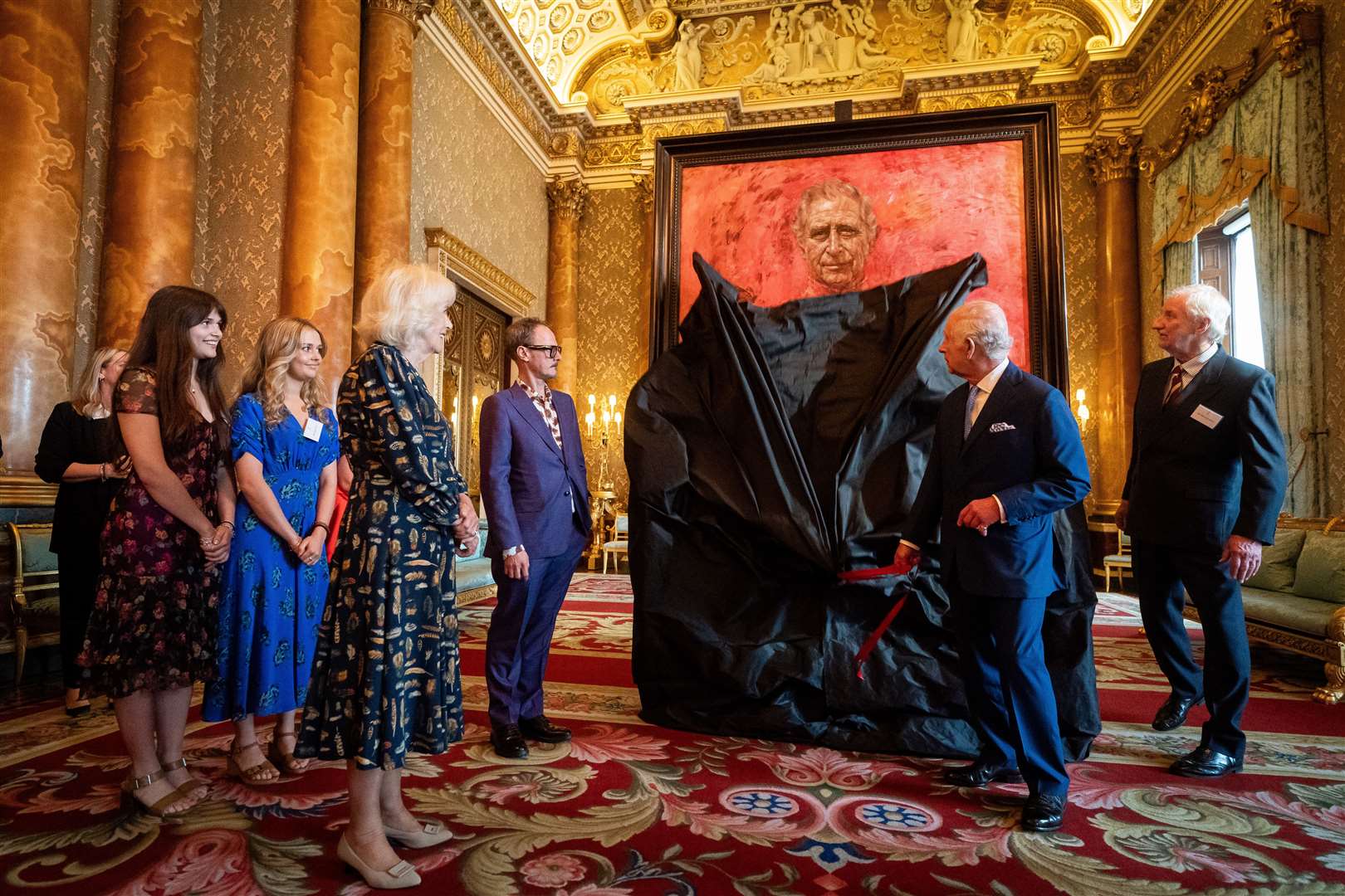 The King and Queen at the unveiling of Jonathan Yeo’s portrait of Charles at Buckingham Palace in May (Aaron Chown/PA)