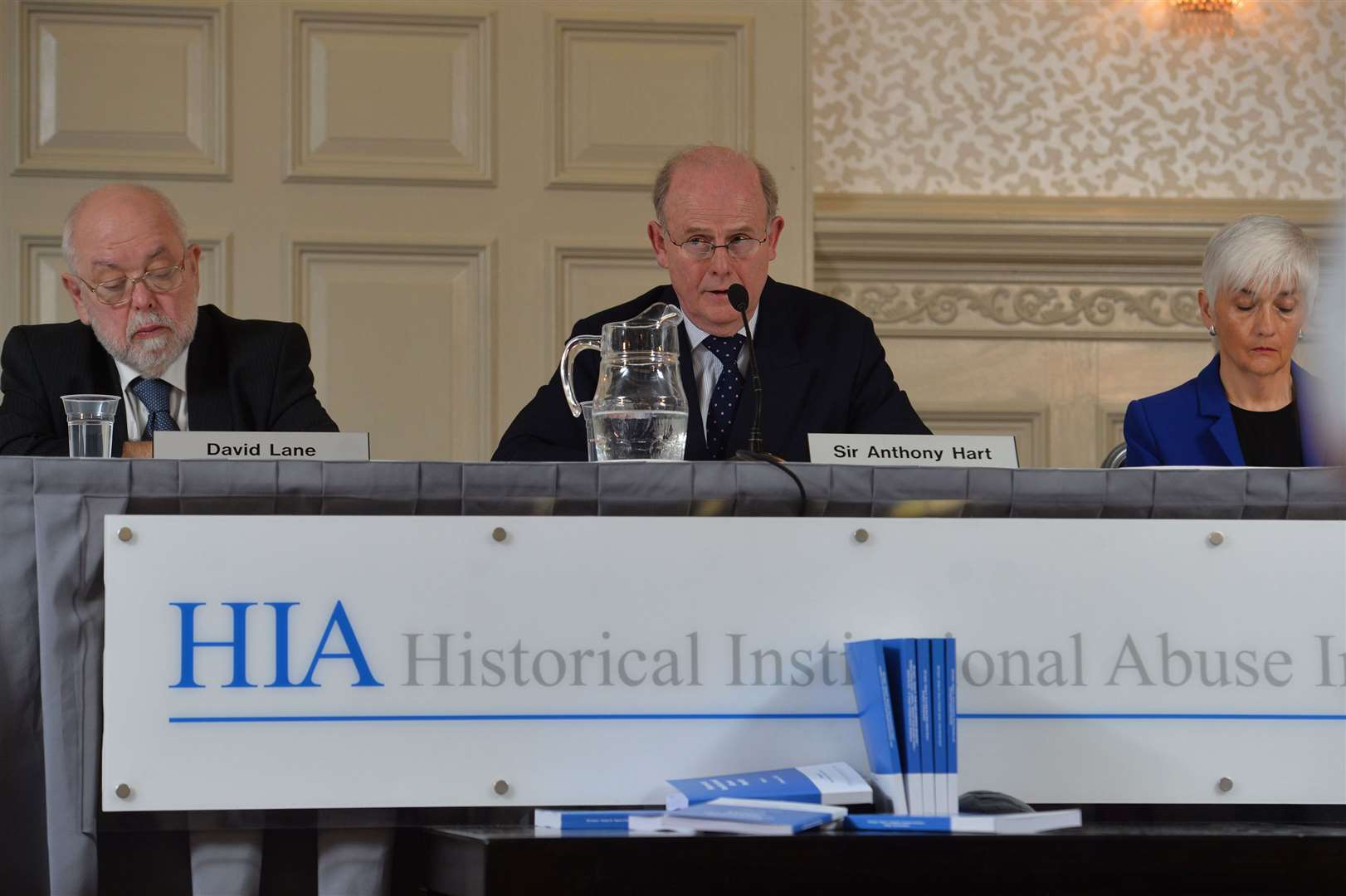 Retired High Court judge Sir Anthony Hart, with David Lane (left) and Geraldine Doherty at the end of the Historical Institutional Abuse Inquiry (Colm Lenaghan/Pacemaker Press/PA)