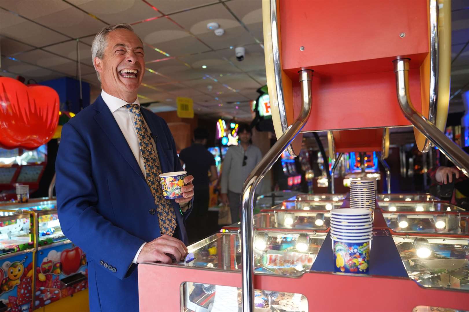 … but also tested his luck by playing a 2p machine in a Clacton-on-Sea arcade (Joe Giddens/PA)