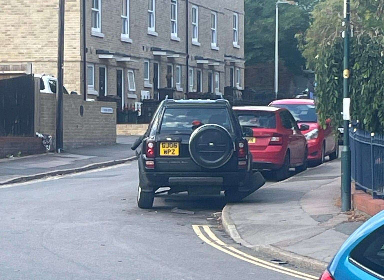 A black Land Rover was among the vehicles which were damaged