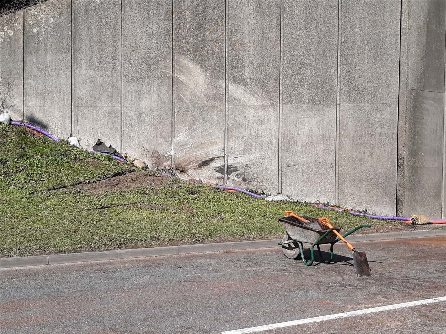 Damage to the wall of the bridge at Junction 9 showed where the Mercedes left the road